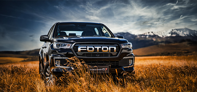 Blcak White Foton Tunland Double Cab in the field